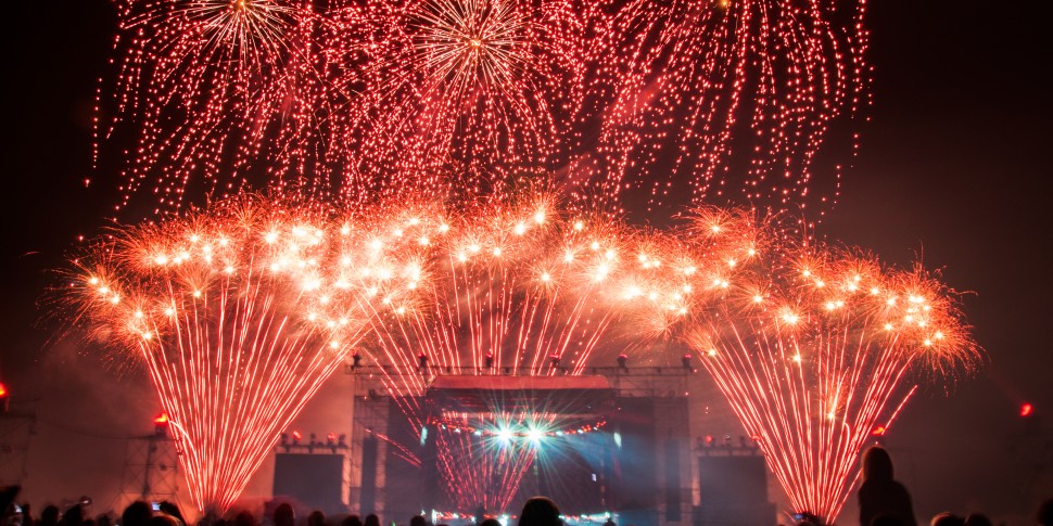 Colorful fireworks above the stage during concert